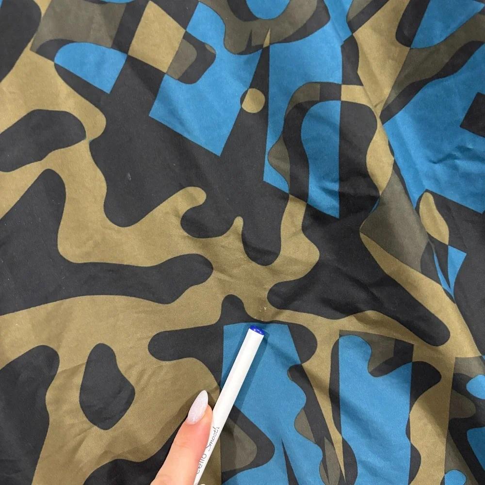 NIKE Running‎ Essentials Jacket Men M Green Blue Camo Reflective Print Hooded
